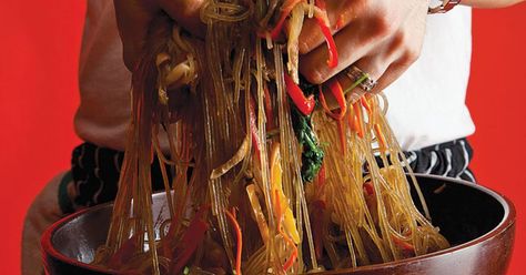 Slippery sweet-potato noodles turn golden from cooking in soy sauce with crunchy vegetables, and tender, juicy beef in this Korean classic. Chap Chae, Korean Sweet Potato Noodles, Stir Fry Glass Noodles, Koreansk Mad, Korean Sweet Potato, Beef And Vegetables, Korean Noodles, Potato Noodles, Korean Food Recipes