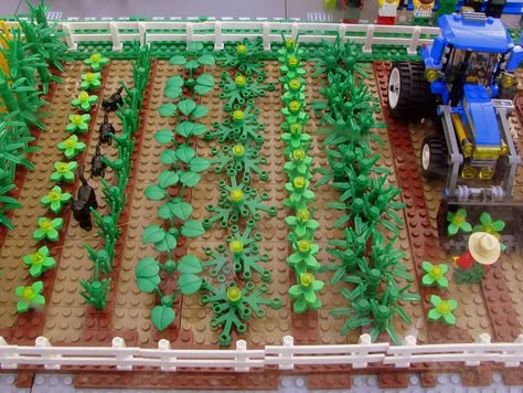 LEGO garden idea - great use of greenery to make so many different plants. Love the tractor, too Lego Garden, Lego Farm, Lego Land, Lego Boards, Lego Diy, Lego Lovers, Lego Activities, Lego Modular, Lego Craft