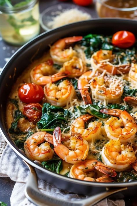 Succulent shrimp are bathed in a luscious, garlic-infused creamy sauce, accompanied by vibrant spinach leaves. The shrimp are cooked to perfection and coated in a velvety sauce, while the spinach adds a refreshing and nutritious element to the dish. Whether served over pasta or enjoyed on its own, this Creamy Tuscan Garlic Butter Shrimp with Spinach is a delightful and satisfying meal that will leave your taste buds craving for more. Shrimp Spinach Risotto, Keto Tuscan Shrimp And Spinach, Shrimp Spinach Recipes, Shrimp And Bacon Recipes, Spinach Artichoke Shrimp, Tuscan Shrimp And Spinach, Creamy Garlic Butter Sauce, Shrimp And Spinach Recipes, Creamy Garlic Prawns