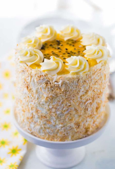 A tropical delight, this passionfruit coconut layer cake is bursting with the sweet and tart flavors of coconut and passionfruit. Coconut Cake Design Ideas, Coconut Cake Aesthetic, Coconut Birthday Cake Ideas, Coconut Cake Design, Coconut Cake Decoration Ideas, Coconut Wedding Cake, Passion Fruit Filling, Coconut Birthday Cake, Coconut Cake Decoration