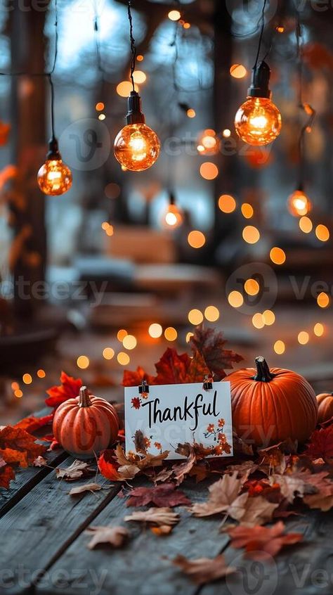 Thanksgiving Table Setting with Pumpkins Autumn Leaves and String Lights Fall Thanksgiving Decorations Diy, Thanksgiving Astetic, Cozy Thanksgiving Aesthetic, Thanksgiving Day Aesthetic, Thanksgiving Pictures Image, Thanksgiving Feast Table, Thanksgiving Cover Photos, Happy Thanksgiving Aesthetic, Thanksgiving Photography