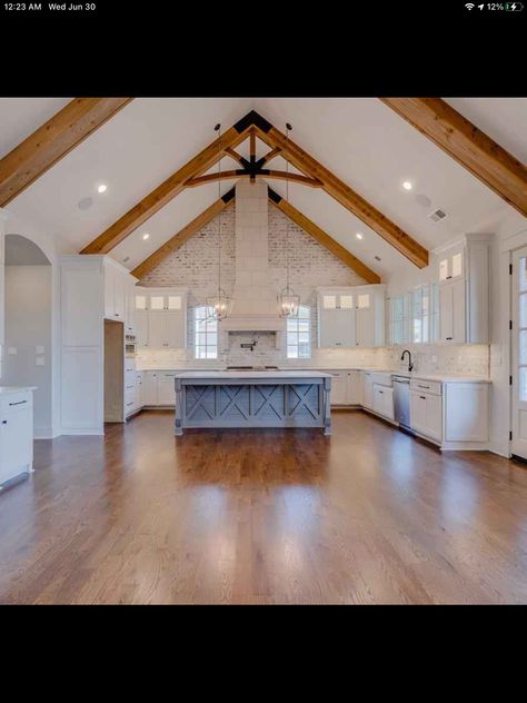 Farmhouse Vaulted Ceiling Kitchen, White Kitchen Cathedral Ceiling, Island Lighting Cathedral Ceiling, Cathedral Ceiling Trusses, Open Ceiling Barndominium, Lighting With Vaulted Ceilings, Kitchen With Cathedral Ceiling Open Floor, Kitchen With Gabled Ceiling, Kitchen With Vaulted Ceiling And Beams