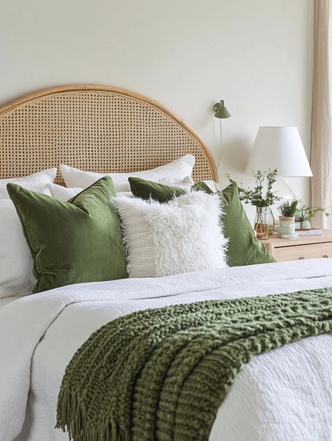 Transform your space with a home bedroom refresh! 🌟 This cozy setup features plush green cushions, a textured throw, and a rattan headboard. Perfect for creating an inviting and serene atmosphere. Try this look and enhance your comfort! #BedroomDecor #HomeRefresh 🌱 Off White And Green Bedroom, Sage And Rattan Bedroom, White Tan And Green Bedroom, Rattan And Green Bedroom, White Bed With Green Accents, White Gold And Green Bedroom, Green Bedroom Accessories, Bedroom Renter Friendly, Green Bed Spread