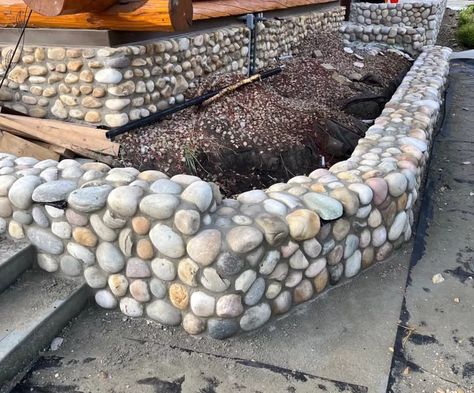 18 Cheap Retaining Wall Ideas Using Affordable Materials Easy Retaining Wall Ideas Cheap, Low Retaining Wall Ideas, Cheap Retaining Wall Ideas, Inexpensive Retaining Wall Ideas, Rock Wall Fencing, Nostalgic House, Cheap Retaining Wall, Wooden Retaining Wall, Railroad Tie Retaining Wall