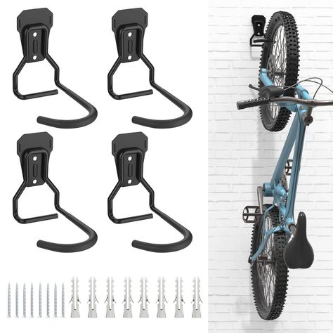 PRICES MAY VARY. 🛵 Heavy Duty Bike Rack: Made of strong iron material, provide a high load capacity, up to 77-99lbs/35-45kg. Strong enough to hold all kinds of bicycles, like mountain bike, road bike, cruiser bike, kids bike, etc. 🛵 Easy to Use: Hang and detach the bike in a second, easily store your bike inside your garage, carport, or apartment. 🛵 Horizontal Bike Storage: Foldable design that you can fold the bicycle holder upwards when not in use, save more space for storage. A must-have s Bicycle Hanger, Bike Hooks, Garage Hooks, Bike Hanger, Support Velo, Garage Bike, Bicycle Frames, Bicycle Storage, Wall Mount Rack