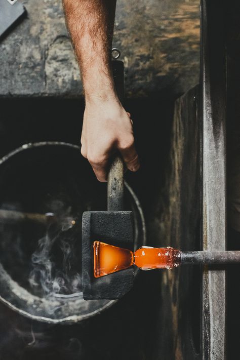 Molding  A cherry wood mold is used to shape  the base of the glass. The mold is made in-house,  as are all the factory’s tools. Glass Blowing Aesthetic, Tools Photo, Glassblowing Studio, Country Photography, Mayfly, Arte Alien, Blown Glass Art, Old Tools, Glass Molds