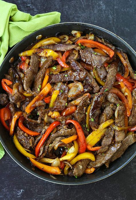 This delicious Pepper Steak is a family favorite meal! Our boys love this steak dinner served over rice! Guy Fieri Recipes, Pepper Steak Stir Fry, Easy Steak Fajitas, Beef Cubes, Spicy Steak, Steak And Rice, Steak Fajita Recipe, Pepper Steak Recipe, Beef Fajitas