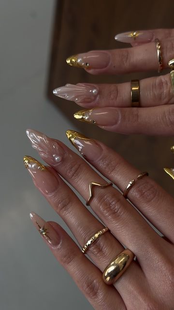 Nelsy G✨ on Instagram: "Gold nails inspo ✨ 
Name plate ring by: @foreverlinkx 
.
#nailinspo #nailtech #losangelesnails #losangelesnailtech #ontarionails #frenchnails #almondnails #nailtrends #ienails #fashioninspo #fallnails" Gold And Nude Nail Designs, Glittery Gold Nails, Fall Nails With White, Gold Bday Nails, Glam French Tip Nails, Nail Design Ideas 2024, Birthday Fall Nails, Citrine Nails, Gold Nail Designs Almond