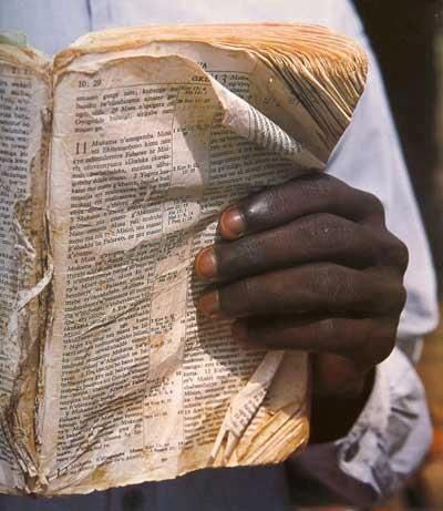 This picture speaks volumes .... We have no idea how seriously people treasure the Bible in third-world countries! Third World Countries, Quotes About Photography, Jesus Is Life, We Are The World, Third World, Lord And Savior, Jesus Saves, Jesus Loves, His Hands