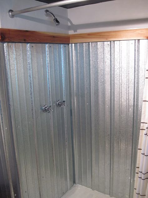 Hmmm.  Galvanized metal shower surround [links to the full DIY how-to].  INteresting. Galvanized Shower Walls, Corrugated Metal Shower, Galvanized Shower, Tin Shower, Rustic Bathroom Shower, Primitive Bathrooms, Closet Remodel, Bathroom Closet, Shower Surround