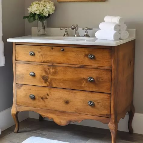 Introduction Transforming a vintage dresser into a custom bathroom vanity is a fantastic way to combine style and functionality while adding a unique touch to your bathroom. Not only does ... Read more Convert Cabinet To Bathroom Vanity, Farmhouse Bathroom Vanity Colors, Dresser Turned Into Bathroom Vanity Farmhouse, Old Dresser Turned Bathroom Vanity, Old Dresser To Bathroom Vanity, Antique Dresser To Bathroom Vanity, Antique Dresser Turned Bathroom Vanity, Chest Of Drawers Bathroom Vanity, How To Add Height To Bathroom Vanity