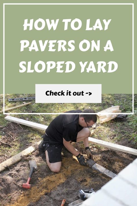 Man kneeling and placing pavers on a sloped yard with tools around. Pavers On Sloped Yard, Sloped Front Yard Walkway, Sloped Garden Path, Rock Steps On Slope, Pavers On A Slope, How To Level Ground For Pavers, Walkway On A Slope, Path On A Slope, Leveling Yard