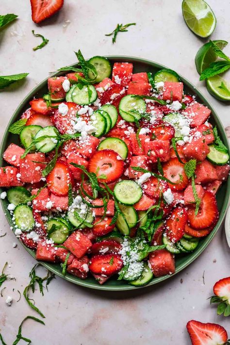 Watermelon + cucumber make for the most refreshing possible summer salad. Paired with sweet, juicy strawberries, tangy, salty feta and herbaceous mint, nothing beats this watermelon cucumber salad on a hot day. Southern Salad Recipes, Tuna Tortilla, Diet Meal Recipes, Watermelon Cucumber Salad, Southern Salad, Garlic Pull Apart Bread, Watermelon Mint Salad, Picnic Salad, Beginners Recipes