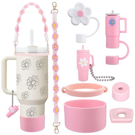 PRICES MAY VARY. Pink stanley cup accessories: This meticulously crafted combo set is the perfect addition to your stanley cup experience, featuring a charming daisy straw cover, a mini stanley cup straw cap, a floral handle, a set of spill stopper, a cup boot, and an adorable mini stanley cup-shaped charm. These accessories not only add a personal touch to your cup but also enhance your overall enjoyment. Protection with Style: The silicone cup sleeve in this set gives your stanley cup the extr Family Friendly Vacations, Mini Stanley, Pink Stanley Cup, Tumbler Cups Ideas, Cup Keychain, Pink Stanley, Happy M, Straw Cover, Stanley Cups