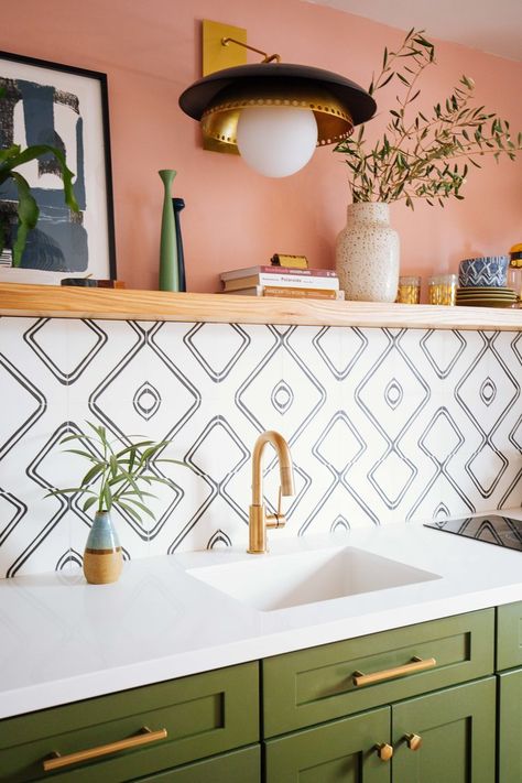 Green Cabinets Orange Backsplash, Constance Moss Kitchen, Colorful California Home, Colorful Backsplash Tile, Funky Boho Living Room, Moroccan Kitchen Ideas, Floating Table Wall, Moroccan Kitchen Backsplash, Morocco Kitchen