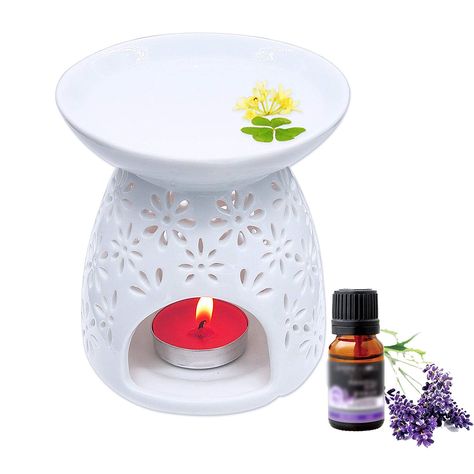 Use aromatherapy with your yoga or meditation practice with this essential oil warmer. A tea light candle diffuses the oils so you get the benefits while you practice. Best Essential Oil Diffuser, Garden Candle, Essential Oil Burner, Tea Light Candle Holders, Candle Making Business, Oil Warmer, Tea Light Candle Holder, Decoration For Living Room, Essential Oil Candles