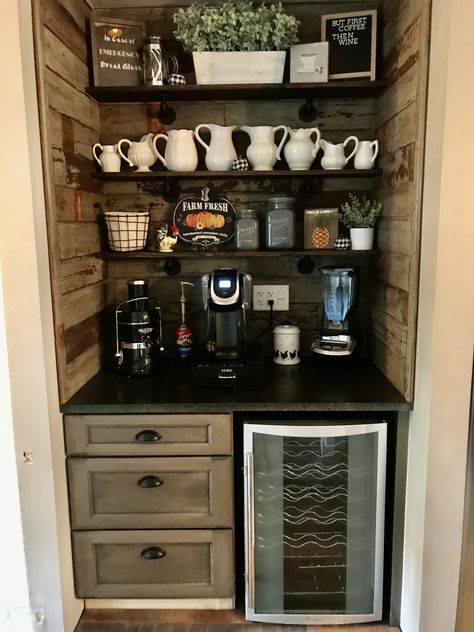 We created this coffee bar/wine bar from an old coat closet.  We used real barnwood to line the walls.  I sealed it with black wax from DIY PAINTS.  The shelves are boards from Restore-hardware from Menards...we sprayed black.  Still need to add wine glass slides and hooks for coffee cups Coffe Closet, Wine And Coffee Bar Closet, Coffee Bar Ideas In Pantry, Coffee Bar Closet Ideas, Coffee Bar In Closet Ideas, Coffee Closet Ideas, Coffee Bar In Pantry Closet, Closet Coffee Bar Ideas, Closet Into Coffee Bar