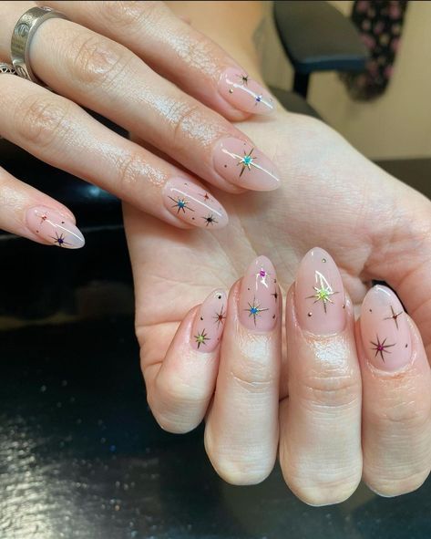 Stars Star Manicure Ideas, Star Jewel Nails, Gold Star Glitter Nails, Star Detail Nails, Gel Nail Designs Rhinestones, Gem Star Nails, Chrome Celestial Nails, Short Almond Nails Celestial, Silver And Gold Star Nails