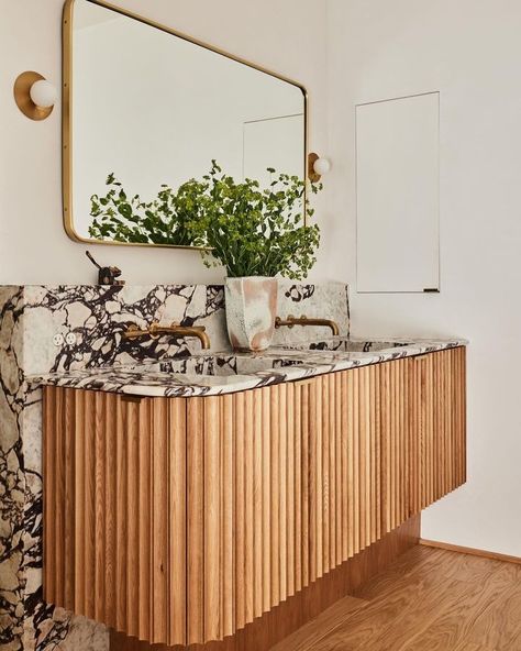 fluted vanity • Instagram Frame Wainscoting, 265 Wall Lamp, Picture Frame Wainscoting, Cabinetry Ideas, Vista House, Malibu Beach House, Powder Room Decor, Travertine Coffee Table, Primary Bathroom