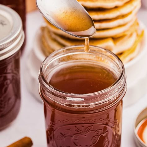 This apple syrup recipe transforms kitchen scraps into a sweet and flavorful syrup perfect for drizzling on pancakes, waffles, or ice cream. Apple Cinnamon Syrup Recipe, Peach Scrap Syrup, Canning Fruit Syrup, Apple Scrap Syrup, Apple Scraps Recipes, Canning Apples Recipes, Apple Syrup Recipe, Preserving Apples, Apple Syrup