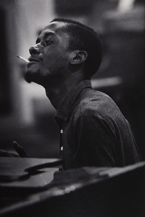 Bobby Timmons sitting at a piano smoking a cigarette. Timmons was a pianist and composer recording as a bandleader as well as sideman with Cannonball Adderley, Art Blakey, and others. Musician Boyfriend Aesthetic, Bobby Timmons, Blue Mood Board, Jazz Photography, Cannonball Adderley, Jazz Fashion, April In Paris, Art Blakey, Jazz Players