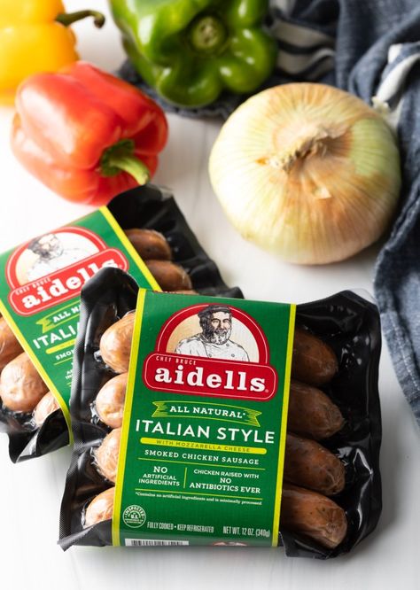 Two packages of Aidells chicken Italian Sausages, with raw whole onion and bell peppers in the background. Aidells Chicken Sausage, Peppers On The Grill, Aidells Sausage, Italian Sausage Links, Chicken Italian, Chicken Sausage Recipes, Roasted Tomato Pasta, Italian Sausages, Veggie Sausage