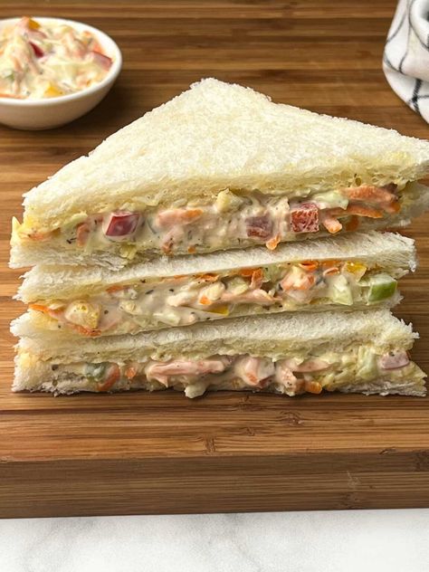 veg mayo sandwich stacked on a wooden board with vegetable-mayonnaise mixture on the side Veg Mayo Sandwich, Cheese Mayo Sandwich, Best Cold Sandwich Recipes, Mayo Sandwich Recipes, Quick Sandwich Ideas, Recipes With Mayonnaise, Veg Mayonnaise Recipe, Vegetarian Snack Recipes, Veg Mayonnaise Sandwich