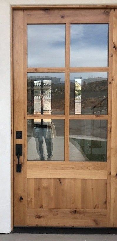 Single Front Door Ideas Farmhouse, French Front Doors Farmhouse, Barndominium Single Front Door, Glass Front Door Single, Brown Farmhouse Door, Wood Front Doors Entrance, Garage Entry Door Farmhouse, Knotty Pine Front Door, Natural Wood Front Door Farmhouse