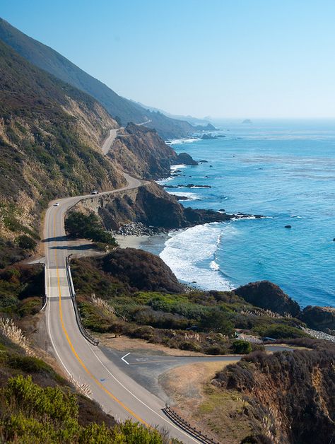 The Pacific Coast Highway winding along the California coast south of Big Sur Pacific Coast Highway Road Trip, Pacific Coast Highway, California Dreaming, California Coast, Beautiful Places In The World, Road Trip Usa, Pacific Coast, Places In The World, California Travel