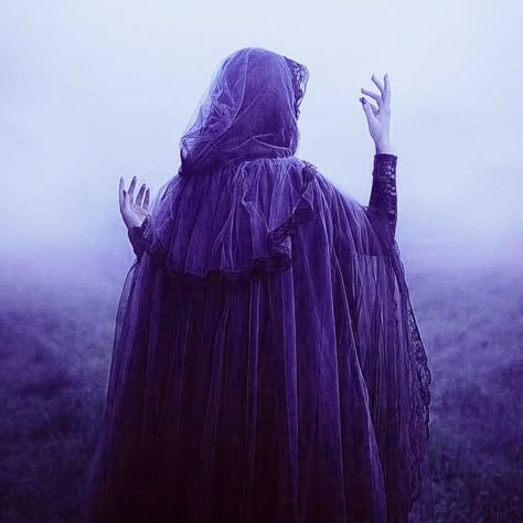 Sorcerer Aesthetic Purple, Purple Mist Aesthetic, Violet Witch Aesthetic, Fantasy Aesthetic Purple, Purple Warlock Aesthetic, Purple Witch Hat Aesthetic, Purple Raven Aesthetic, Female Wizard Aesthetic, Purple Cloak Aesthetic