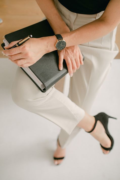 detailed shot of a elegant business woman wearing stylish trousers, black heels, watch and ready to write in her agenda Coach Branding Photoshoot, Business Owner Photoshoot, Coach Branding, Attract Clients, Personal Branding Photoshoot, Women In Leadership, Brand Photography, Branding Photoshoot, Personal Brand