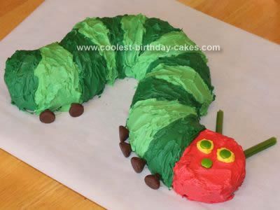 Coolest Very Hungry Caterpillar Cake using bundt cake, a loaf cake, Hershey's kisses (eyes), sprees(face), and fruit twists (antennae). Hungry Caterpillar Cake, Very Hungry Caterpillar Party, Very Hungry Caterpillar Birthday, Caterpillar Cake, Caterpillar Party, Hungry Caterpillar Party, Hungry Caterpillar Birthday, Childrens Birthday Cakes, The Very Hungry Caterpillar