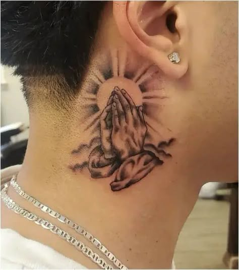 If you have been looking for unusual tattoo designs with praying hands for a long time, then our article is for you. We have collected 55+ of the most interesting and their meanings in human life. Angle Tattoo For Men, Prayer Hands Tattoo, Tato Realis, Pray Tattoo, Praying Hands Tattoo Design, Best Neck Tattoos, Praying Hands Tattoo, Small Neck Tattoos, Side Neck Tattoo