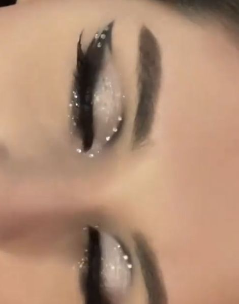 Black Glitter Prom Makeup, Makeup With Star Glitter, Dark Makeup With Glitter, Silver Eye Makeup With Rhinestones, Silver Makeup Looks With Rhinestones, Black Sparkle Eye Makeup, Silver Eyeshadow With Rhinestones, Black Eyeshadow With Rhinestones, Cute Black Eyeshadow Looks