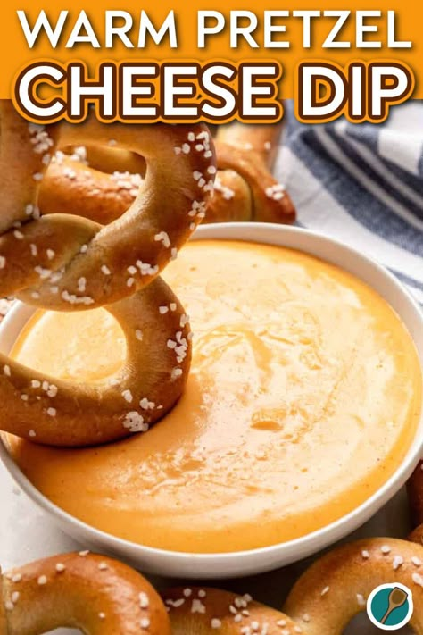 A warm, soft pretzel being dipped into a bowl of creamy cheese dip, topped with a sprinkle of salt. Pretzel Cheese Dip Crockpot, Hot Cheese Dip For Pretzels, Mustard For Pretzels Dipping Sauces, Sharp Cheddar Recipes, Warm Cheese Dip Recipes, Pretzel Mustard Dip, Mustard Dip For Pretzels, Soft Pretzel Dip, Cheese Dip For Soft Pretzels