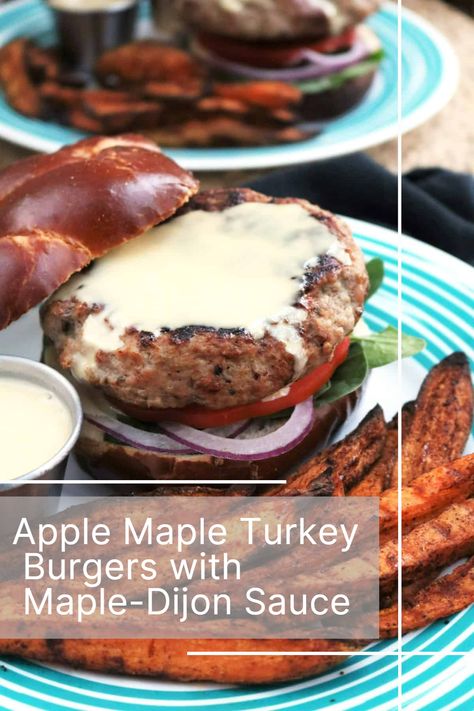 If you think burgers made with poultry are bland, think again. These Apple Maple Turkey Burgers are perfectly seasoned and topped with a Maple-Dijon sauce. #thespiffycookie #nationalhamburgerday #hamburgerday #turkeyburger #maplesyrup Turkey Burger Sauce, Thanksgiving Burger, Turkey Burger With Cranberry Sauce, Turkey Burger Toppings, French Onion Turkey Burgers, Apple Turkey Burgers, Fall Turkey Burgers, Maple Mustard Apple Chicken Burgers, Homemade Turkey Burgers