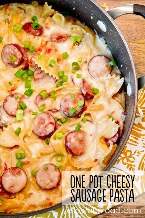 One Pot Cheesy Smoked Sausage and Pasta Skillet - A 20 minutes meal that cooks all in one pot for less mess and goes quickly from stove to table! Smoked Sausage And Pasta, Cheesy Smoked Sausage Pasta, Smoked Sausage Recipes Pasta, Cheesy Sausage Pasta, Sausage And Pasta, Sausage Pasta Skillet, Smoked Sausage Pasta, Pasta Skillet, Resep Pasta