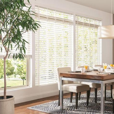 Large-louver blinds give windows a shutter style look and a clearer view out through slats. White Wood Blinds, Faux Blinds, Room Shades, Farmhouse Living Room Curtains, Blinds For French Doors, Blinds For Windows Living Rooms, Living Room Window Treatments, Bali Blinds, Cordless Blinds