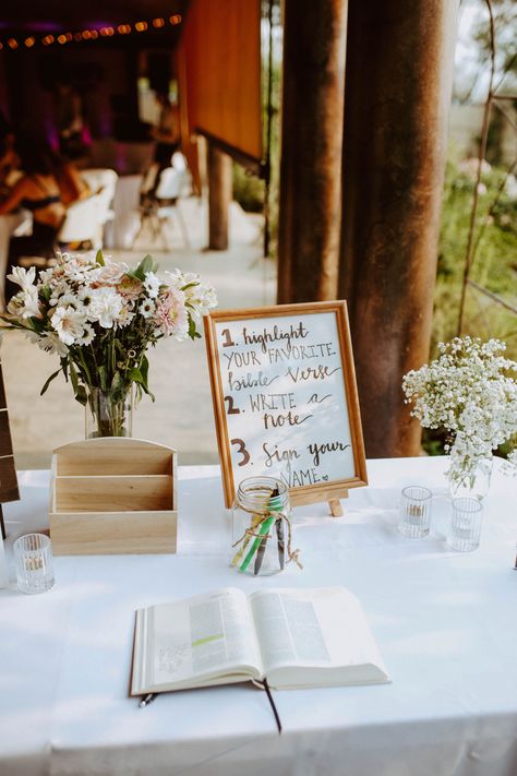 Wedding Bible Sign Guest Books, Bible At Wedding Reception, Sign A Bible Wedding, Fun Christian Wedding Ideas, Christian Beach Wedding Ideas, Christian Guest Book Ideas, Grad Party Bible Guest Book, Bible Verse At Wedding, Christian Wedding Backdrop