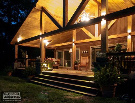 Gabled Roof Covered Cedar Deck with Stone Veneered Columns, a Wood Burning Fire Place and Custom Deck Lighting. Porch Gable, Deck Roof, Gabled Roof, Cedar Deck, Deck Pictures, Rustic House Plans, Deck Installation, Building A Pergola, Cabin Exterior