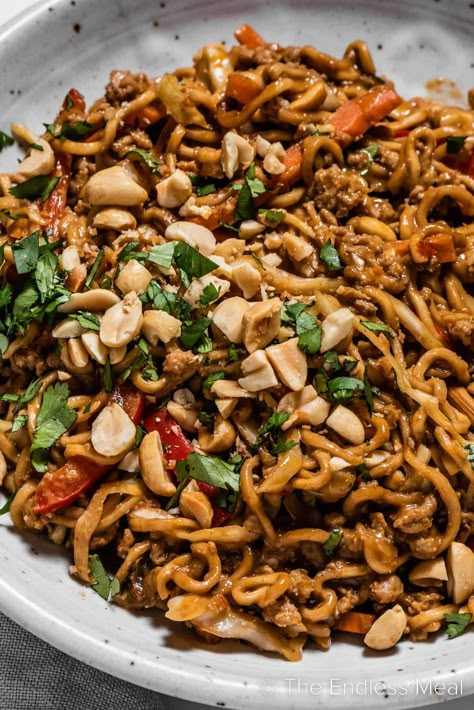 These saucy Thai peanut chicken noodles are a quick and delicious weeknight meal. They're loaded with ground chicken, ramen noodles, and vegetables then smothered in a creamy homemade peanut sauce. They're healthier than takeout, and they're ready in just 25 minutes! #theendlessmeal #peanutnoodles #thainoodles #noodles #chickennoodles #thaichicken #pasta #dinner #easydinner #thai Ramen Noodle Sauce, Ground Chicken Ramen, Chicken Peanut Noodles, Thai Chicken Peanut, Peanut Chicken Noodles, Chicken Ramen Noodle Recipes, Chicken Rice Noodles, Thai Chicken Noodles, Thai Peanut Noodles