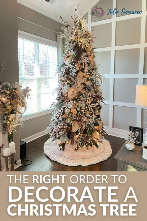 Looking to create a show-stopping Christmas tree this year? Check out our step-by-step guide on the correct order to decorate your tree like a pro! From choosing the perfect tree to adding the final touches with ornaments and ribbon, this guide will help you turn your holiday vision into reality. #ChristmasTreeDecorating #HolidayDecor #ChristmasTreeTips #DIYHolidayDecor How To Style Christmas Tree, How To Decorate A Tree Like A Pro, Layering Ribbon On Christmas Tree, Steps In Decorating A Christmas Tree, Downswept Christmas Tree Decorated, How To Dress A Christmas Tree, Steps To Decorate A Christmas Tree, Order To Decorate Christmas Tree, How To Decorate Tree With Ribbon