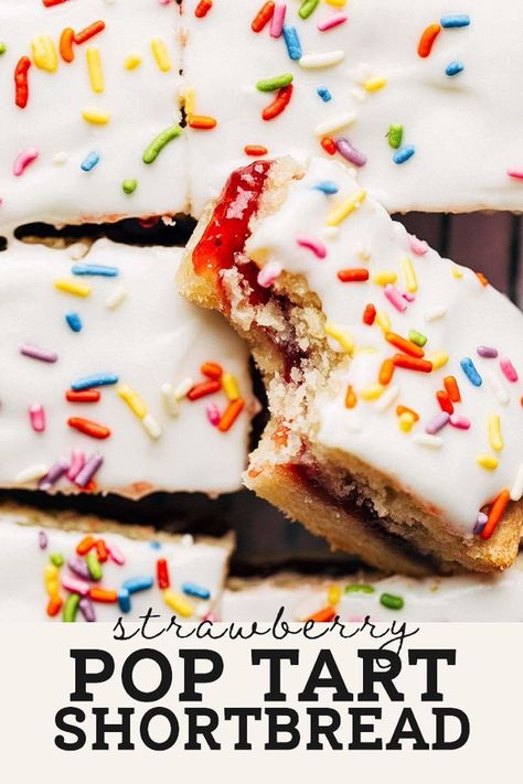 The BEST buttery shortbread baked with a layer of sweet and tart strawberry jam in the center and topped with vanilla icing. Strawberry Shortbread Recipe, Butternut Bakery, Strawberry Pop, Strawberry Pop Tart, Shortbread Bars, Strawberry Dessert Recipes, Pop Tart, Buttery Shortbread, Shortbread Recipes