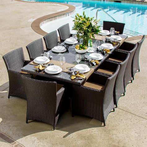 Dine in style with this resin wicker patio dining set by Lakeview. The table expands from 72 to 102 inches and features 3 pieces of tempered glass tops. Browse our numerous collections of patio dining sets and bring the party outside! 10 Person Dining Table, Avery Island, Resin Wicker Patio Furniture, Wicker Dining Set, Patio Sofa Set, Outdoor Patio Set, Rattan Dining, Wicker Patio Furniture, Patio Dining Table