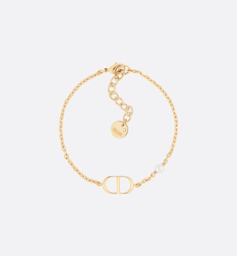 Petit CD Bracelet Gold-Finish Metal with a White Resin Pearl | DIOR Dior Pearl Bracelet, Dior Bracelet Gold, Cd Bracelet, Bracelet Dior, Christian Dior Jewelry, Christian Dior Bracelet, Dior Bracelet, 24 Birthday, Bangle Stack