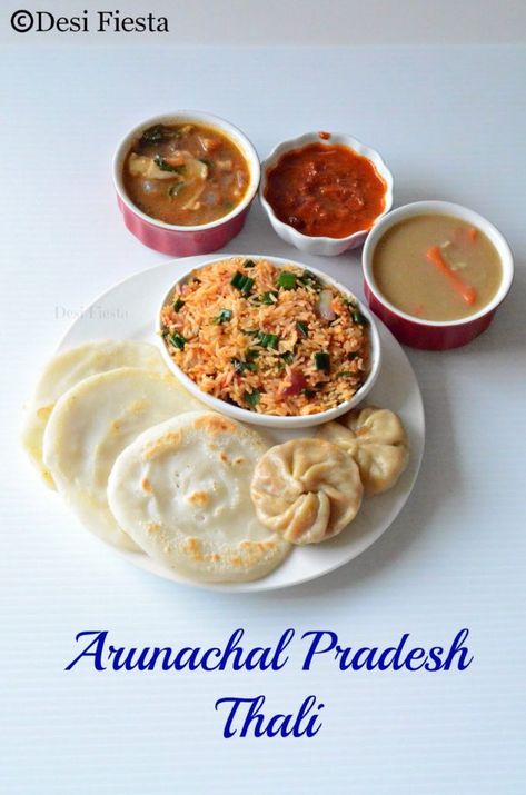 Arunachal Pradesh Thali Veg Momos, Indian Thali, Butter Tea, Arunachal Pradesh, Veg Dishes, Pork Meat, Organic Rice, Bamboo Shoots, Vegetable Stew