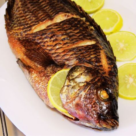 Oven-Baked Whole Tilapia Recipe Cooking Whole Fish In Oven, Baking Whole Fish In Oven, Baked Whole Tilapia Recipes, Cooking Fish In The Oven, Tilapia In Oven, Tilapia In The Oven, Whole Tilapia Recipes, Ways To Cook Tilapia, Whole Tilapia