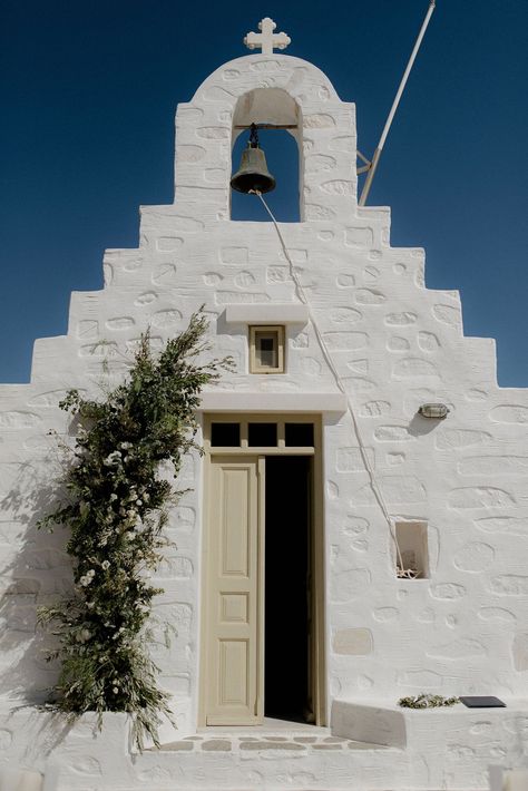 White wedding chapel in Paros, Greece at destination wedding with green and white flower arrangements Greek Chapel Wedding, Wedding Greek Style, Intimate Chapel Wedding, Greece Wedding Reception, Small Greek Wedding, Greek Wedding Flowers, Greek Wedding Aesthetic, Green And White Flower Arrangements, Greece Wedding Aesthetic