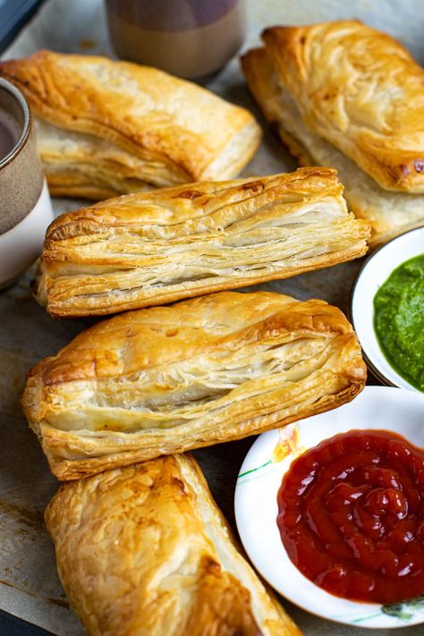 Veg puff filled with a medley of spiced potato and vegetables. It is tucked in store-bought puff pastry sheets to make your life easy! #puffpastry #vegetarian #indian Puff Recipes Indian, Indian Veg Snacks For Party, Vegan Indian Sweets, Veg Indian Snacks, Vegetable Puff Pastry Recipes, Veg Puff Indian Recipe, Puff Pastry Filling Recipes, Puff Pastry Recipes Indian, Veg Puff Pastry Recipes