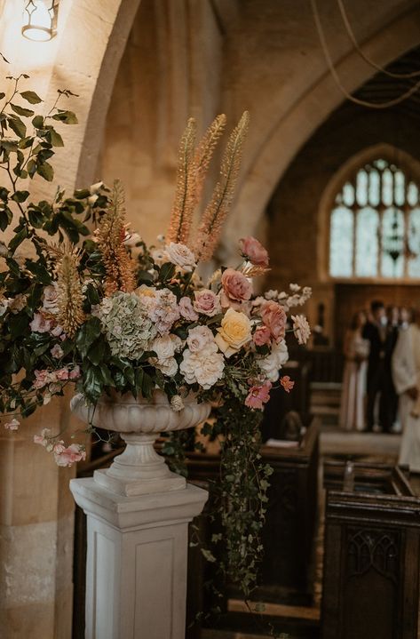 Late summer wedding in the Cotswolds with bride in Suzanne Neville dress and flowers in elegant neutrals of soft champagne, blush and ivory. Bouquets, church flowers, marquee pole installations and table flowers by Cotswolds florists Corky and Prince. Home Reception, Marquee Tent, Floral Sculpture, Church Door, Church Wedding Flowers, Late Summer Wedding, Flower Urn, Suzanne Neville, Summer Wedding Flowers